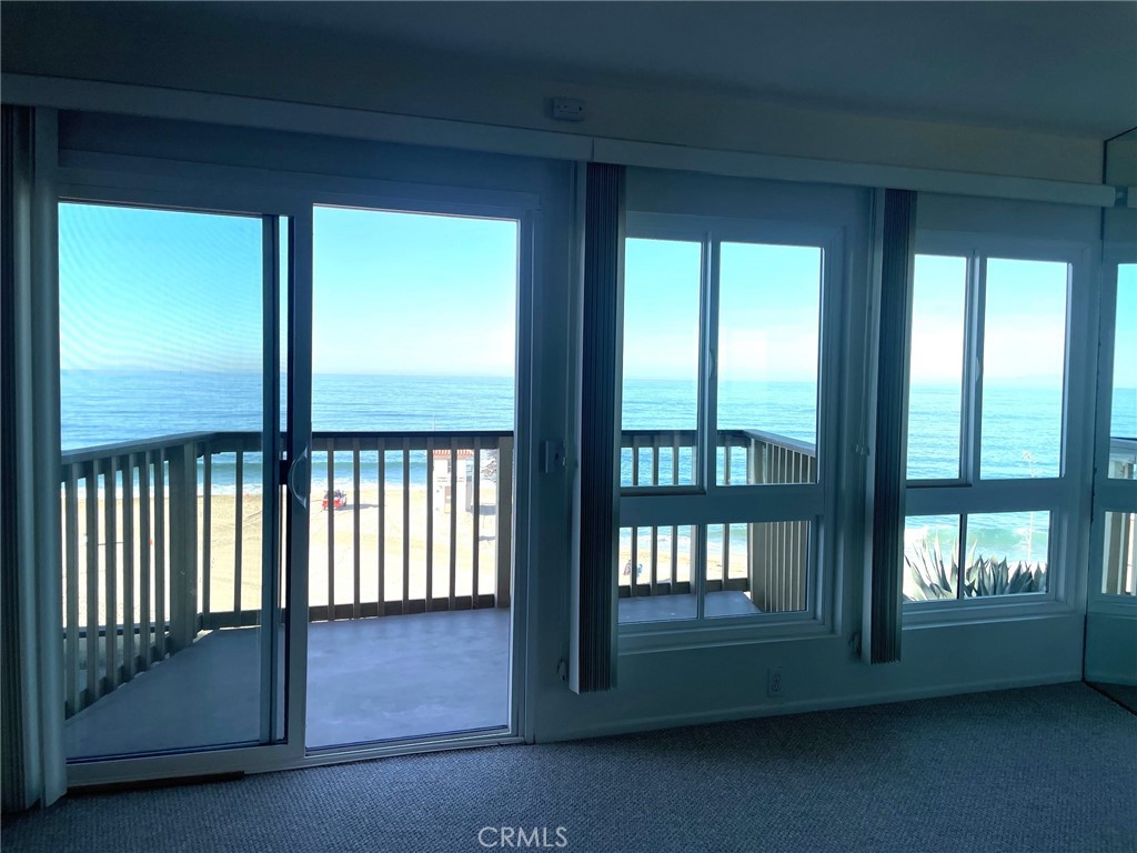 625 Esplanade, Unit 13 Redondo Beach, CA 90277 - Photo 2 of 19 a view of empty room with large windows