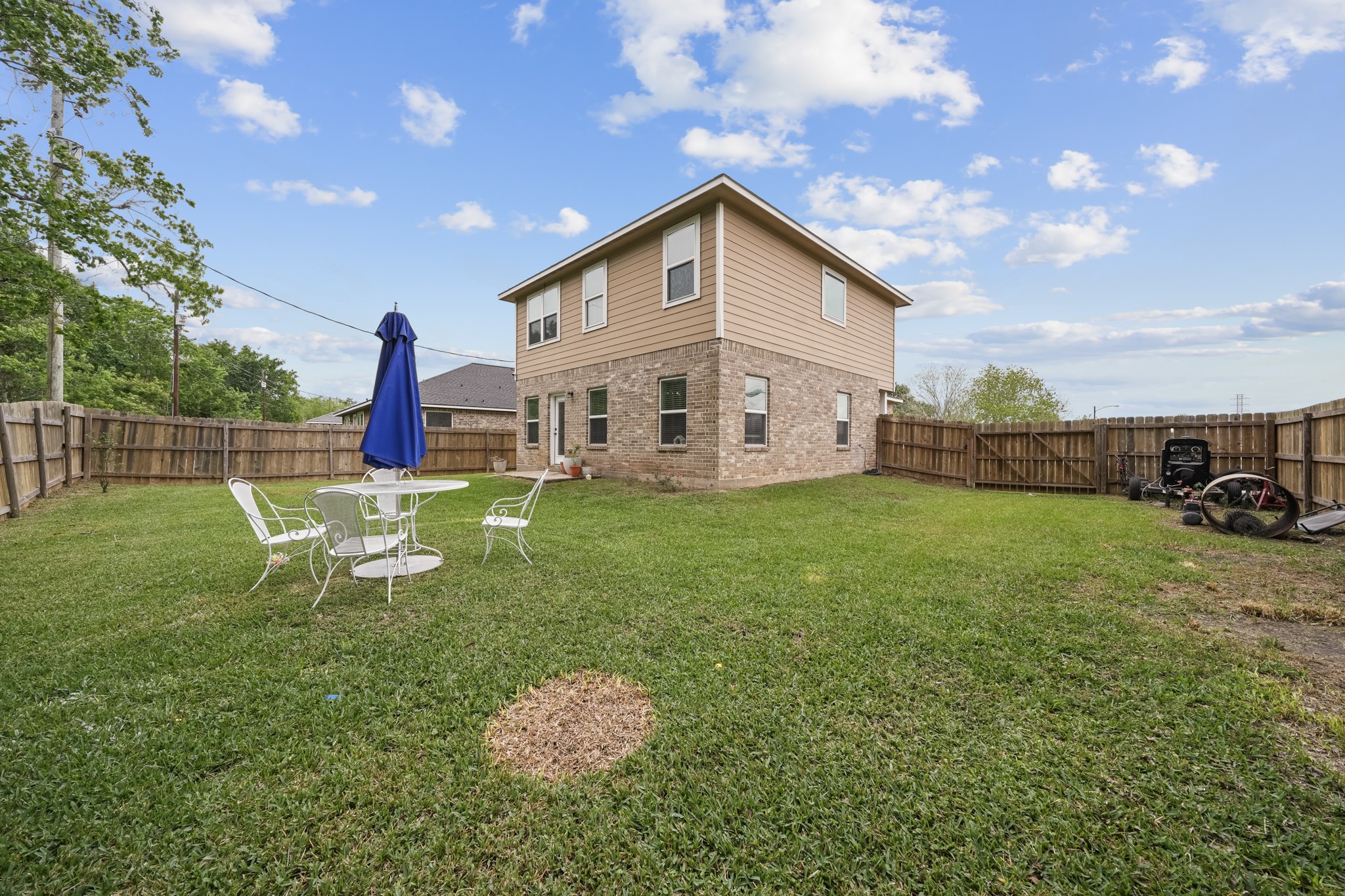 6101 Fox Ridge Drive Angleton, TX 77515 - Photo 30 of 30 a view of a house with a yard