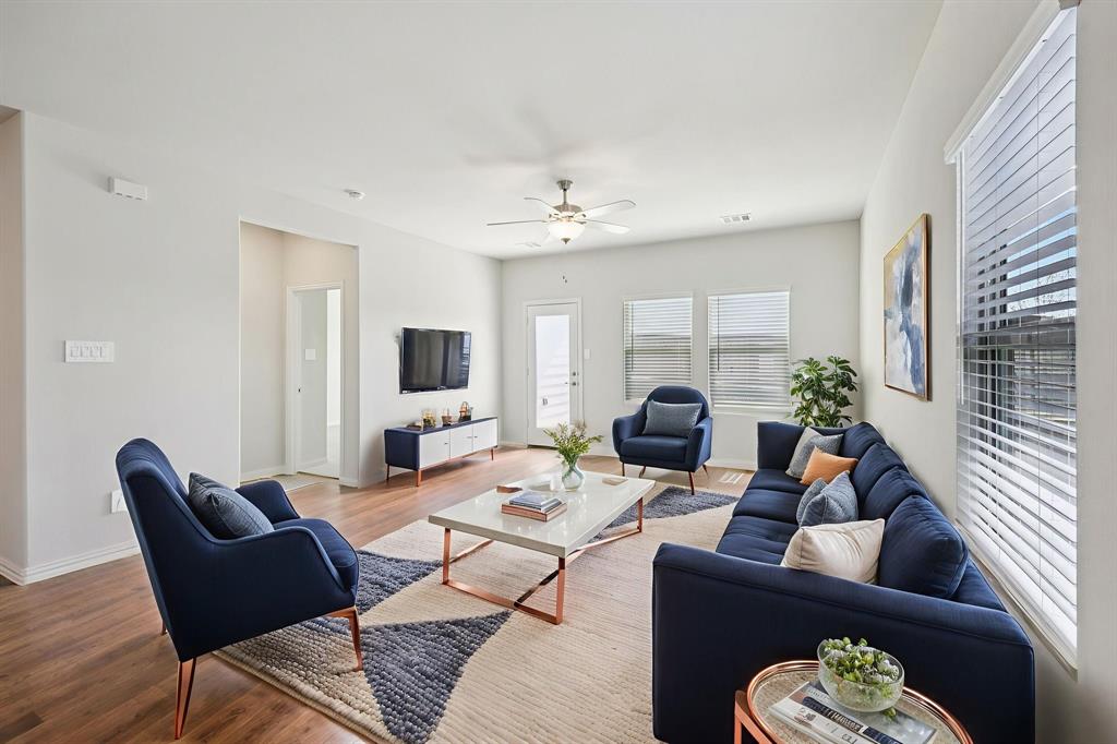 1737 Arches Road Anna, TX 75409 - Photo 13 of 38 a living room with furniture ceiling fan and a window