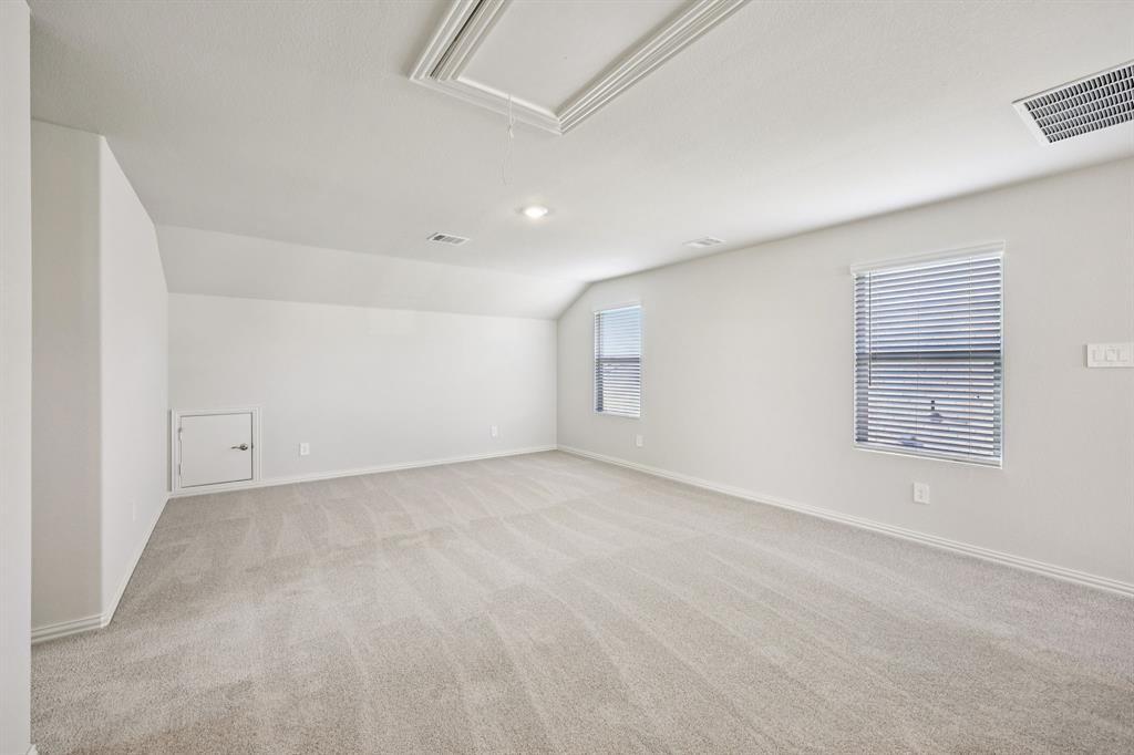 1737 Arches Road Anna, TX 75409 - Photo 21 of 38 a view of an empty room with a window