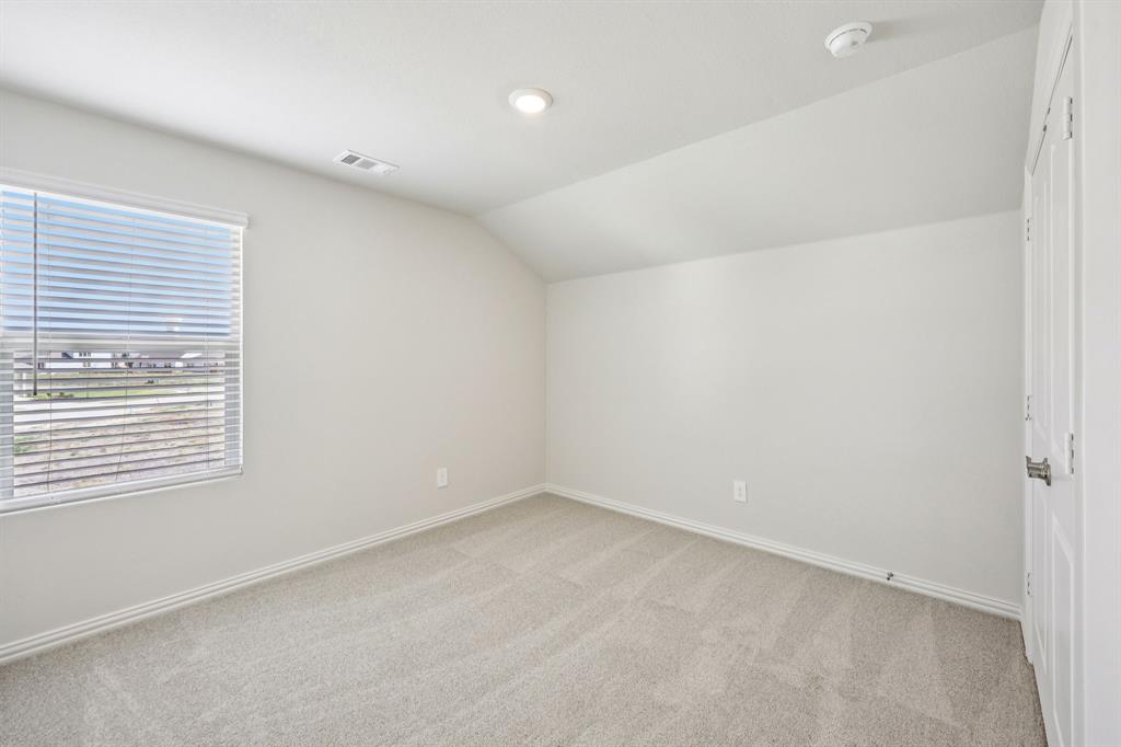 1737 Arches Road Anna, TX 75409 - Photo 24 of 38 a view of an empty room with a window