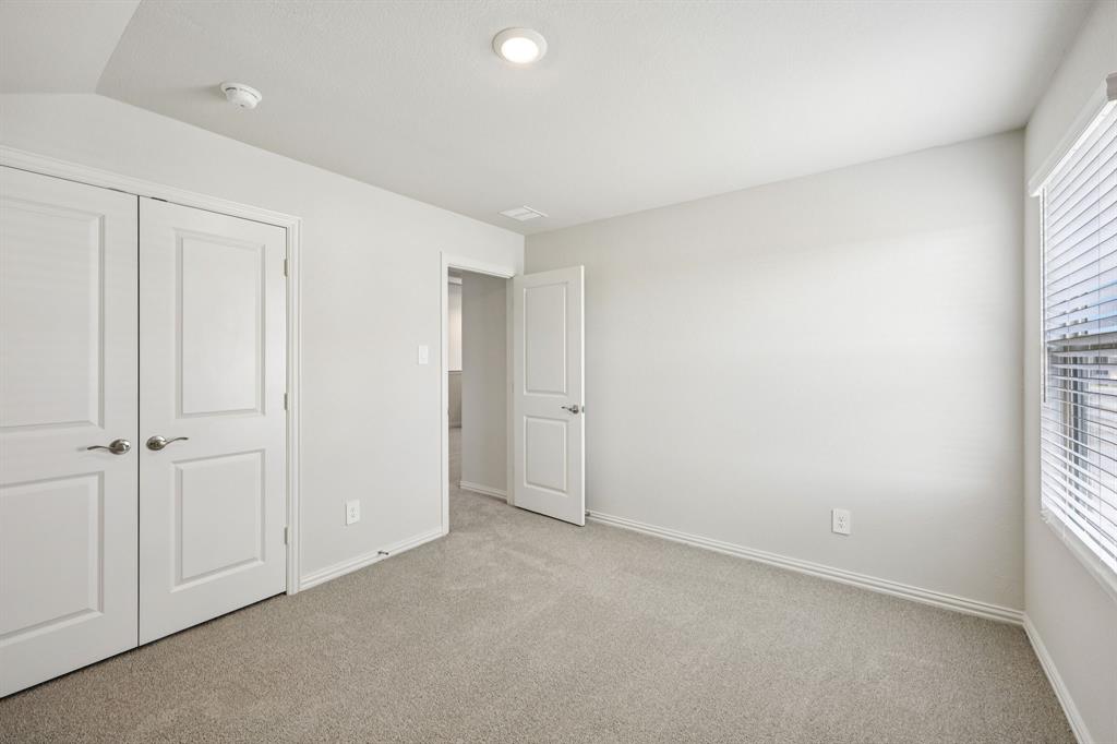 1737 Arches Road Anna, TX 75409 - Photo 25 of 38 an empty room with windows