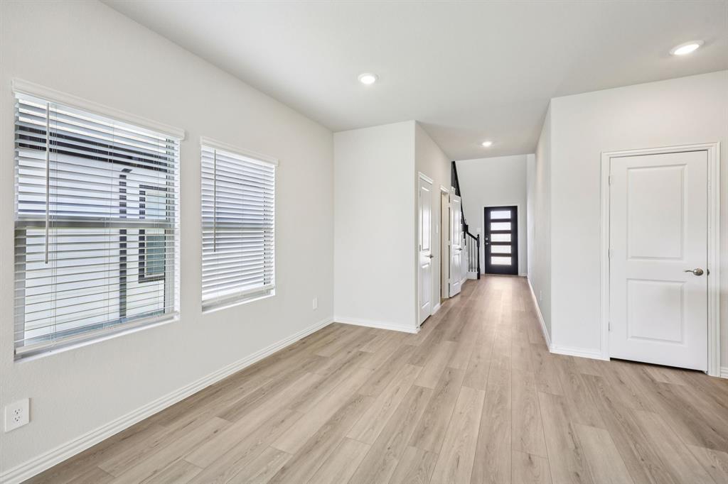 1737 Arches Road Anna, TX 75409 - Photo 9 of 38 a view of a room with wooden floor and window