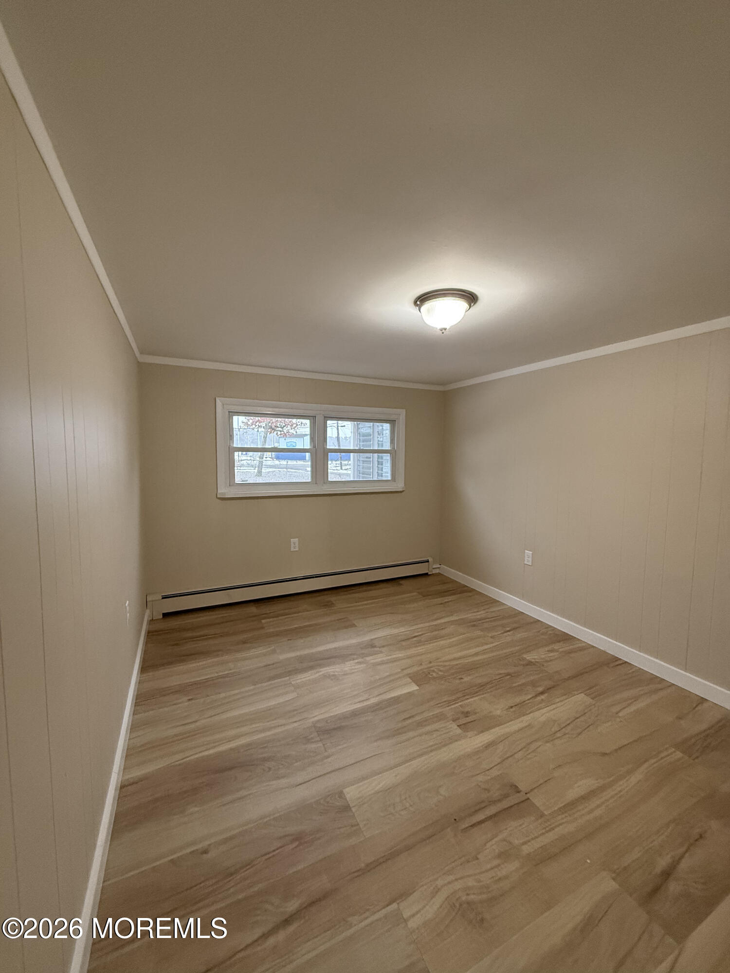 801 Pensacola Road Forked River, NJ 08731 - Photo 1 of 22 a view of an empty room and window