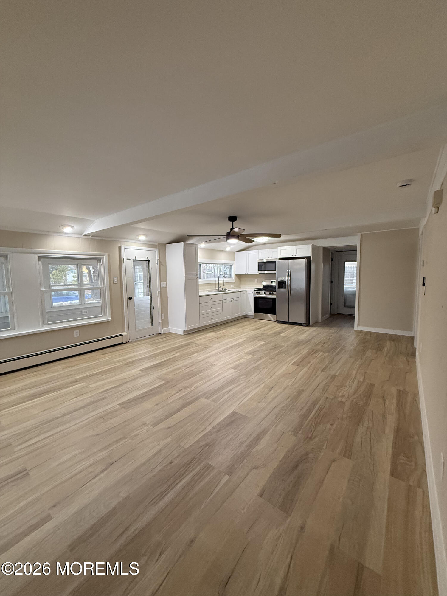 801 Pensacola Road Forked River, NJ 08731 - Photo 14 of 22 a view of a livingroom with furniture wooden floor and window