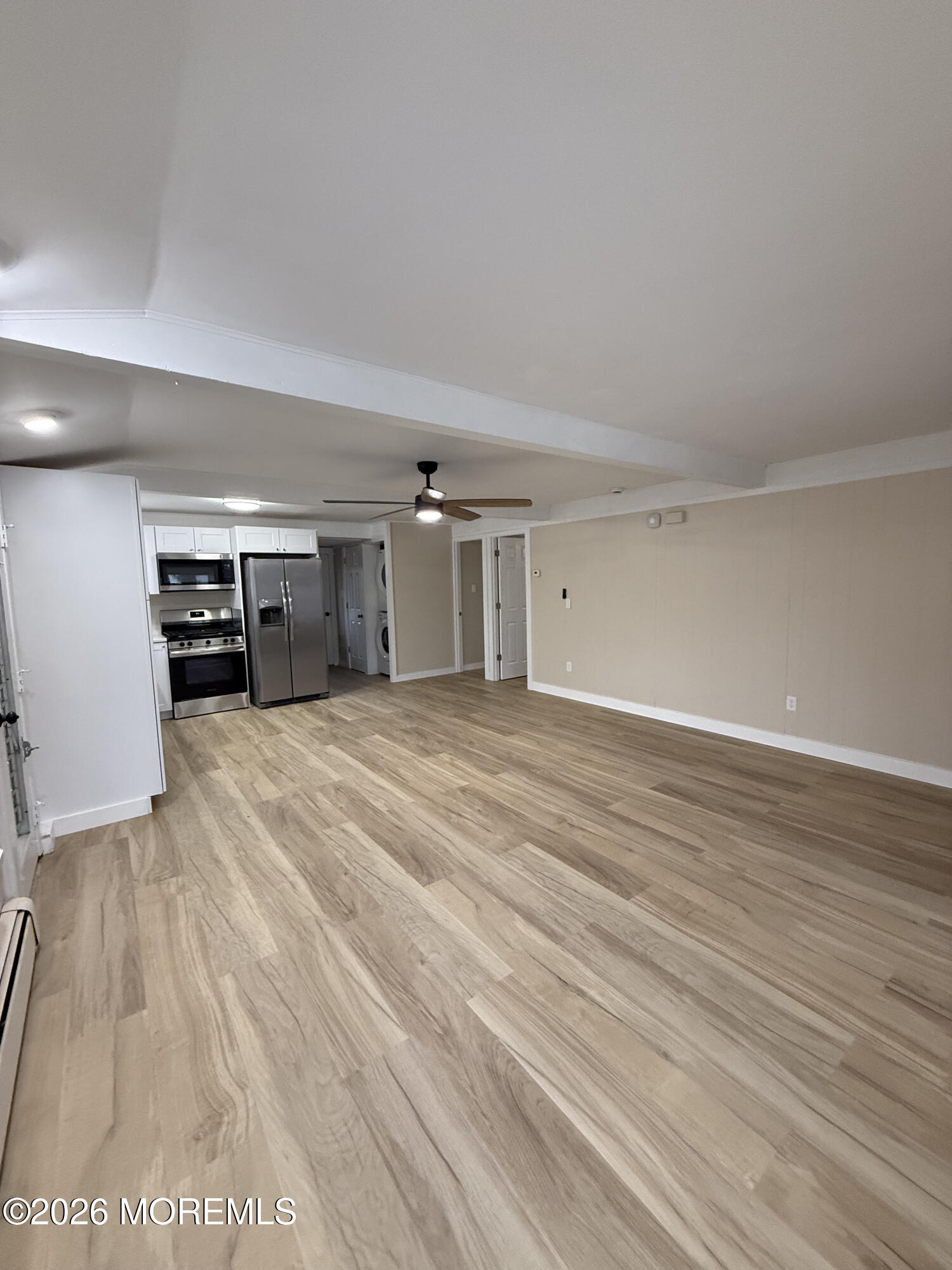 801 Pensacola Road Forked River, NJ 08731 - Photo 15 of 22 a view of empty room with wooden floor