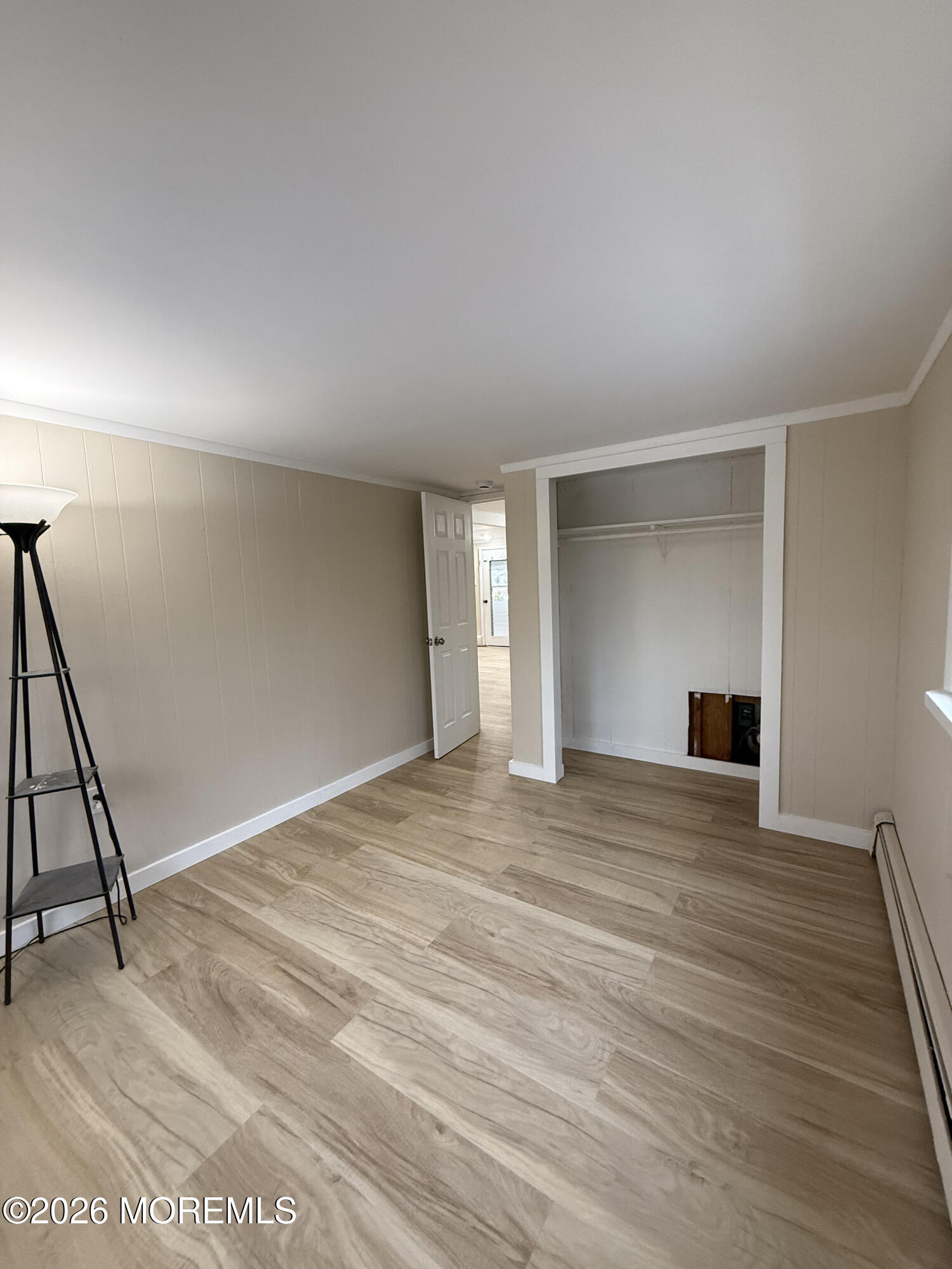 801 Pensacola Road Forked River, NJ 08731 - Photo 22 of 22 a view of empty room with wooden floor