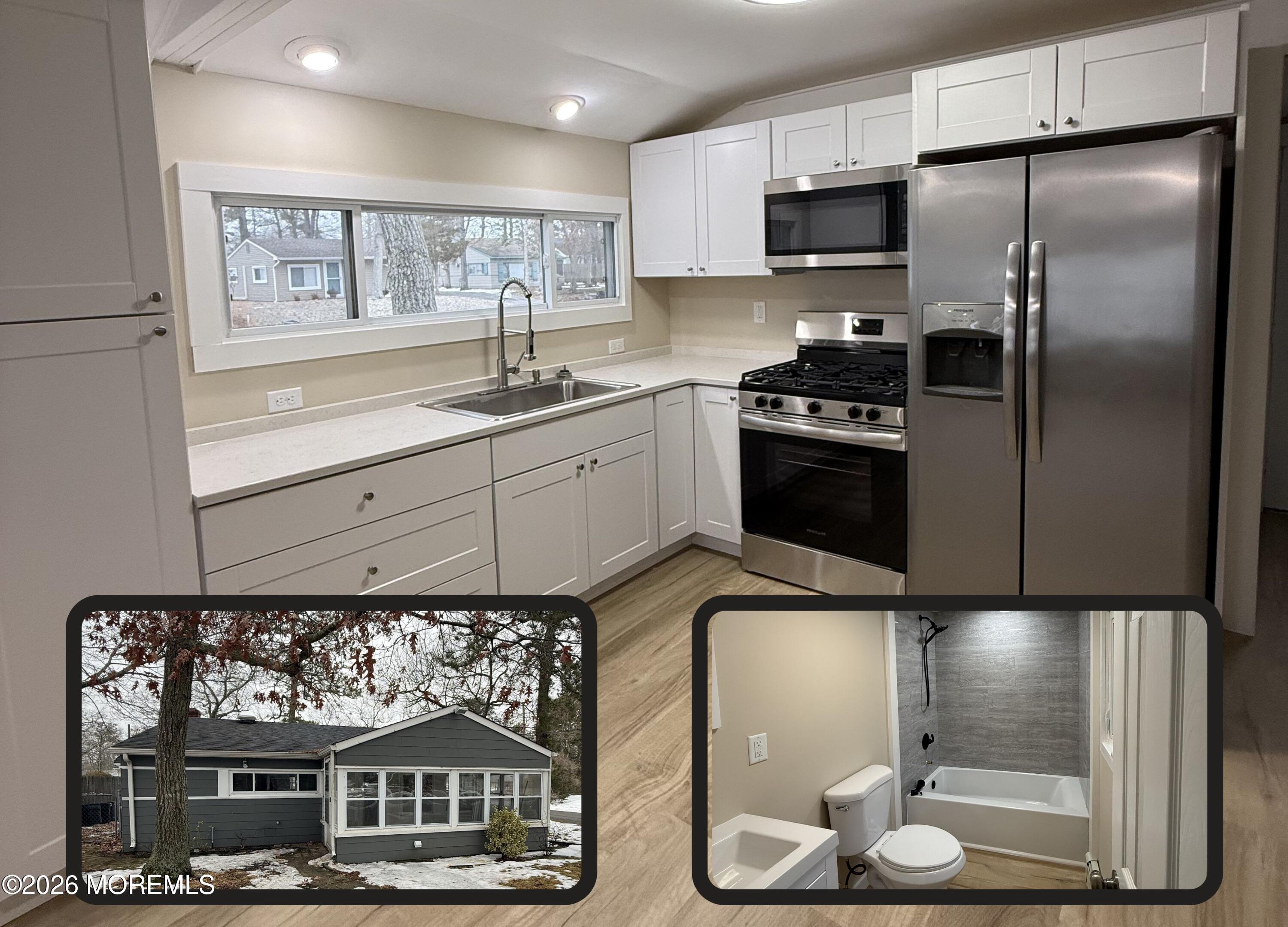 801 Pensacola Road Forked River, NJ 08731 - Photo 10 of 22 a kitchen with stainless steel appliances kitchen island granite countertop a refrigerator and a stove top oven