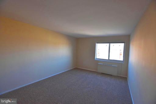 4313 Knox Road, Unit 501 College Park, MD 20740 - Photo 11 of 17 an empty room with a window