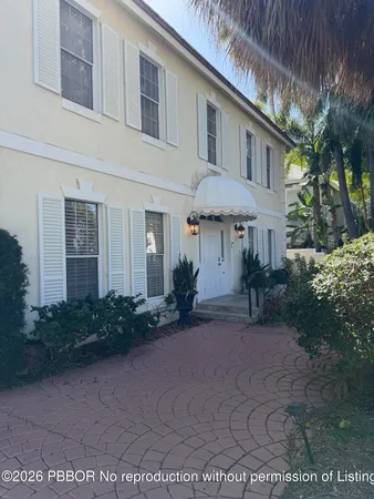 a view of a house with a patio