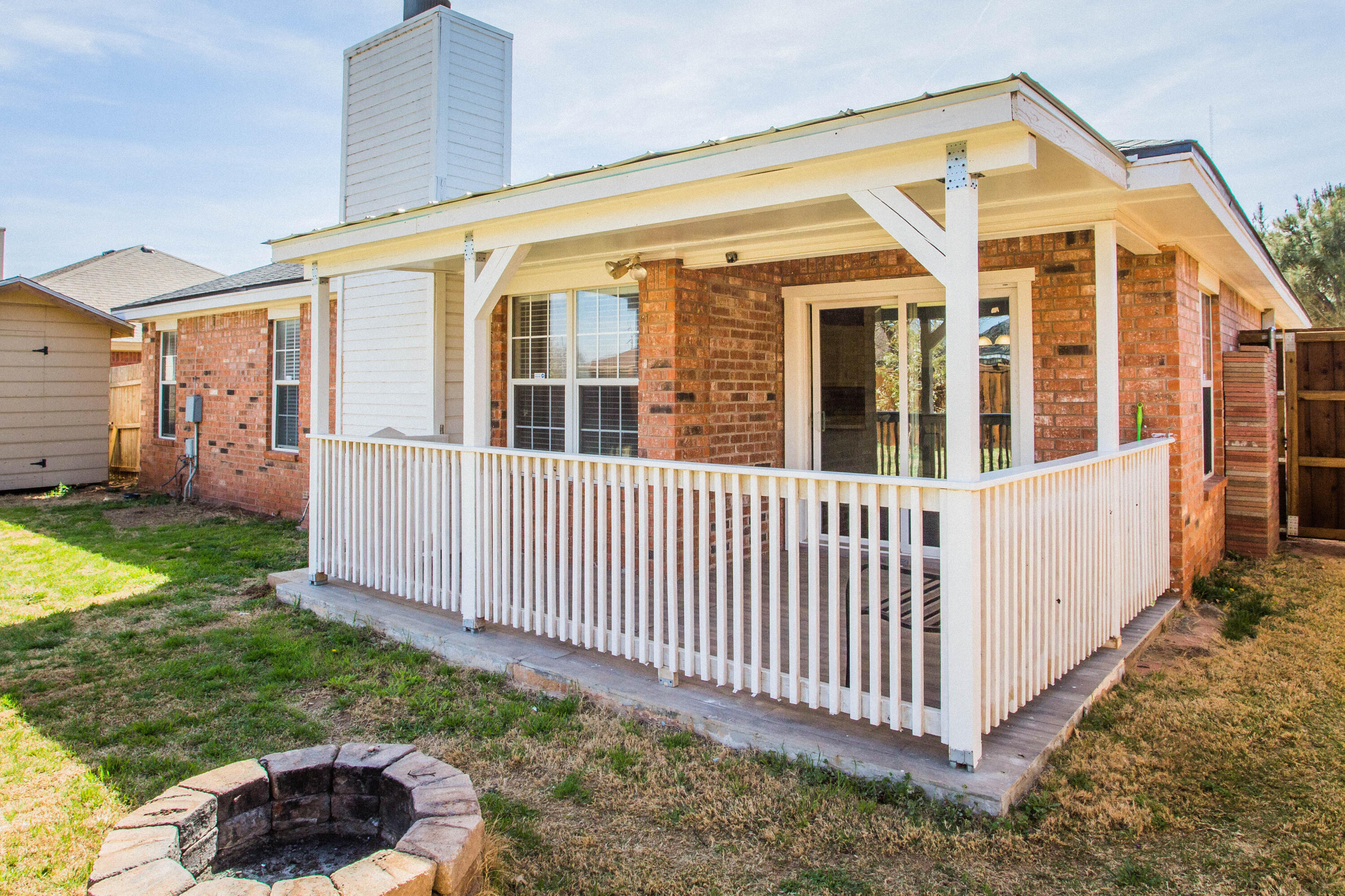 1904 76th Street Lubbock, TX 79423 - Photo 27 of 32 a view of a house with a yard and a garden