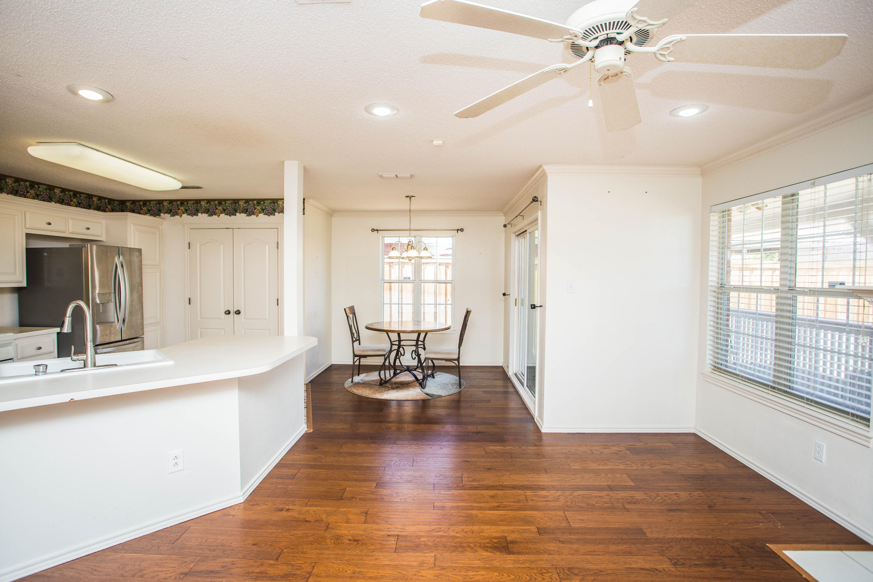 1904 76th Street Lubbock, TX 79423 - Photo 9 of 32 a living room with furniture and a large window