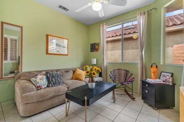 a living room with furniture and a window