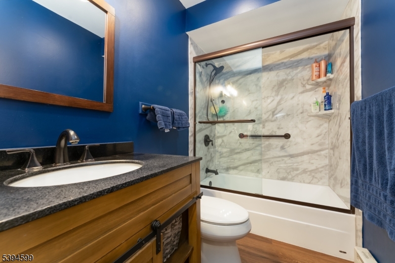 89 North Slope Clinton, NJ 08809 - Photo 11 of 21 a bathroom with a granite countertop sink toilet and shower