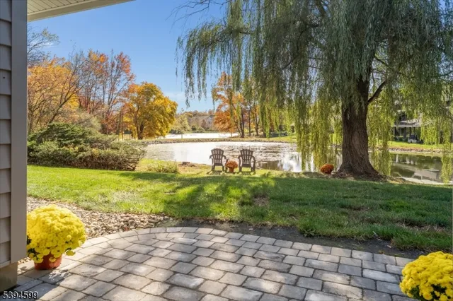 a view of a brick house with an outdoor space