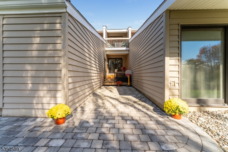89 North Slope Clinton, NJ 08809 - Photo 18 of 21 a view of a brick house with an outdoor space