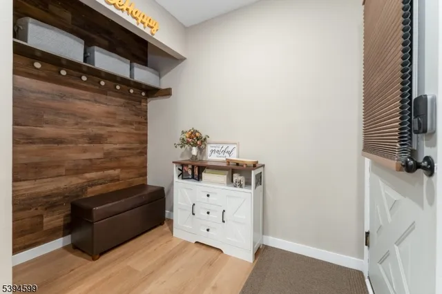 a view of a hardwood floor and wardrobe