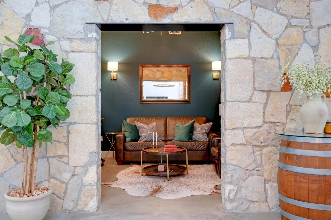 1668 Rocky Road Blanco, TX 78606 - Photo 12 of 33 a living room with furniture and a potted plant