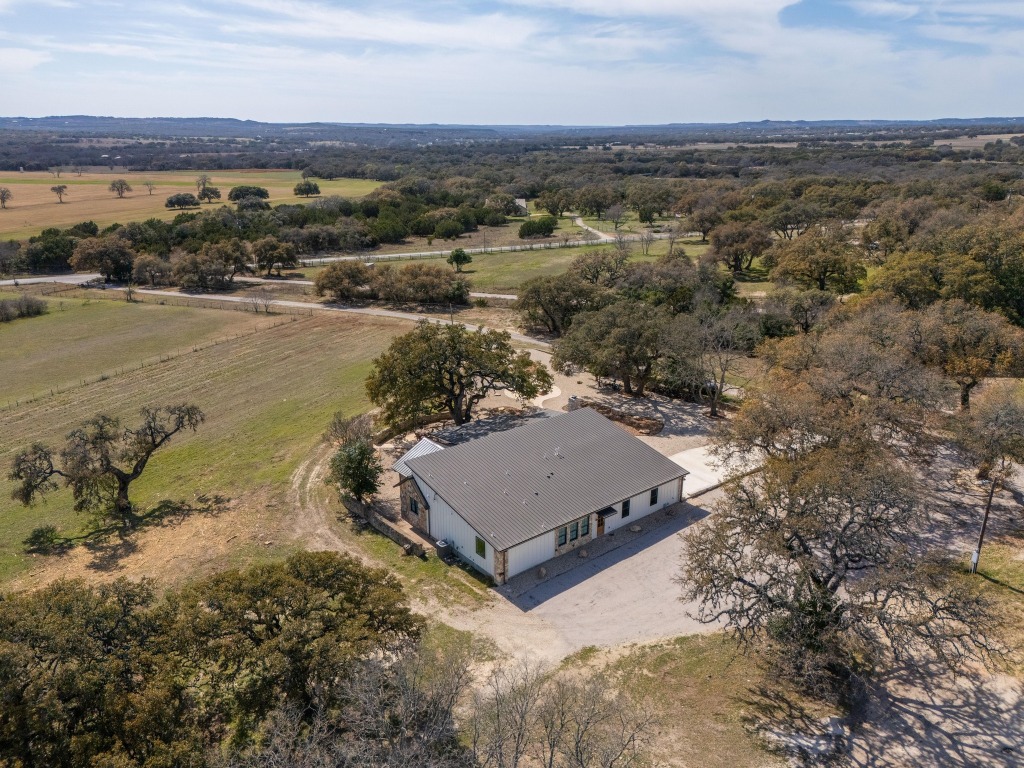 1668 Rocky Road Blanco, TX 78606 - Photo 30 of 33 an aerial view of a house with a yard