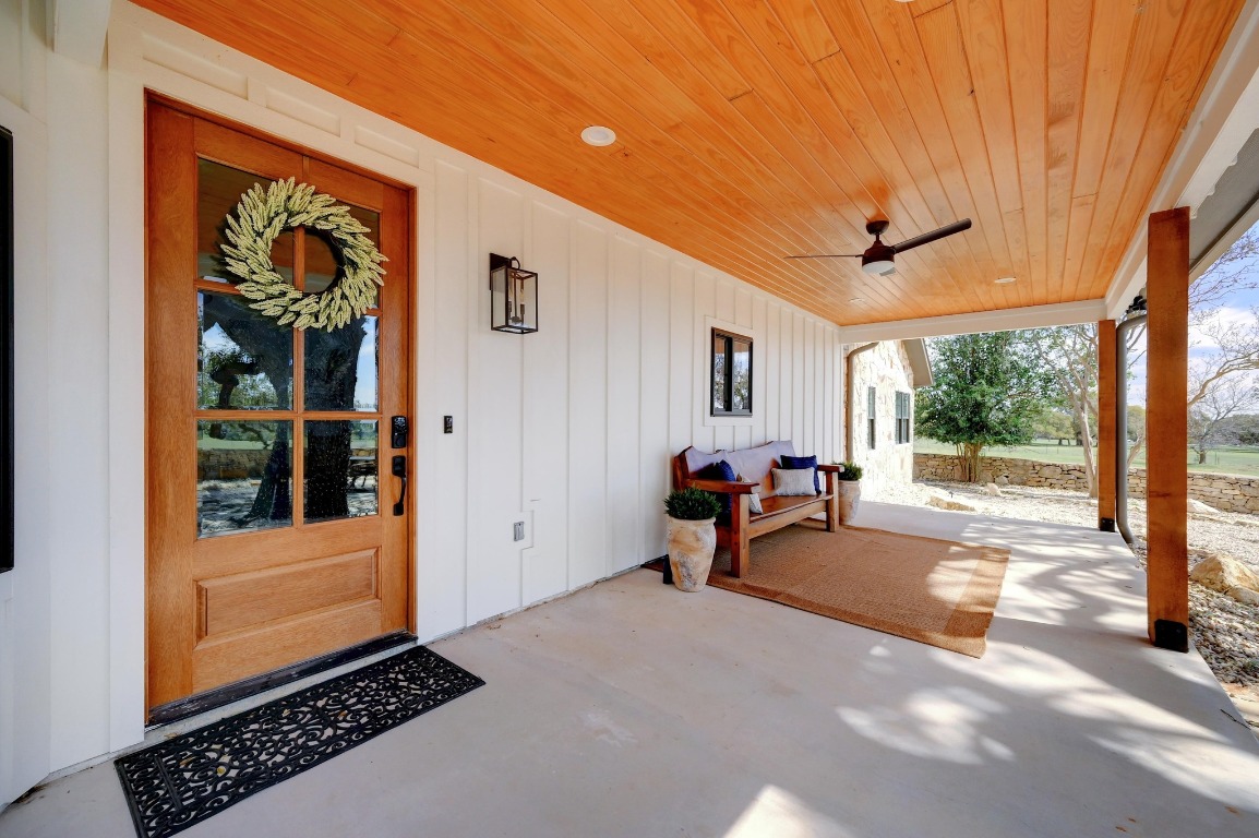 1668 Rocky Road Blanco, TX 78606 - Photo 7 of 33 a view of a livingroom with a patio and a yard