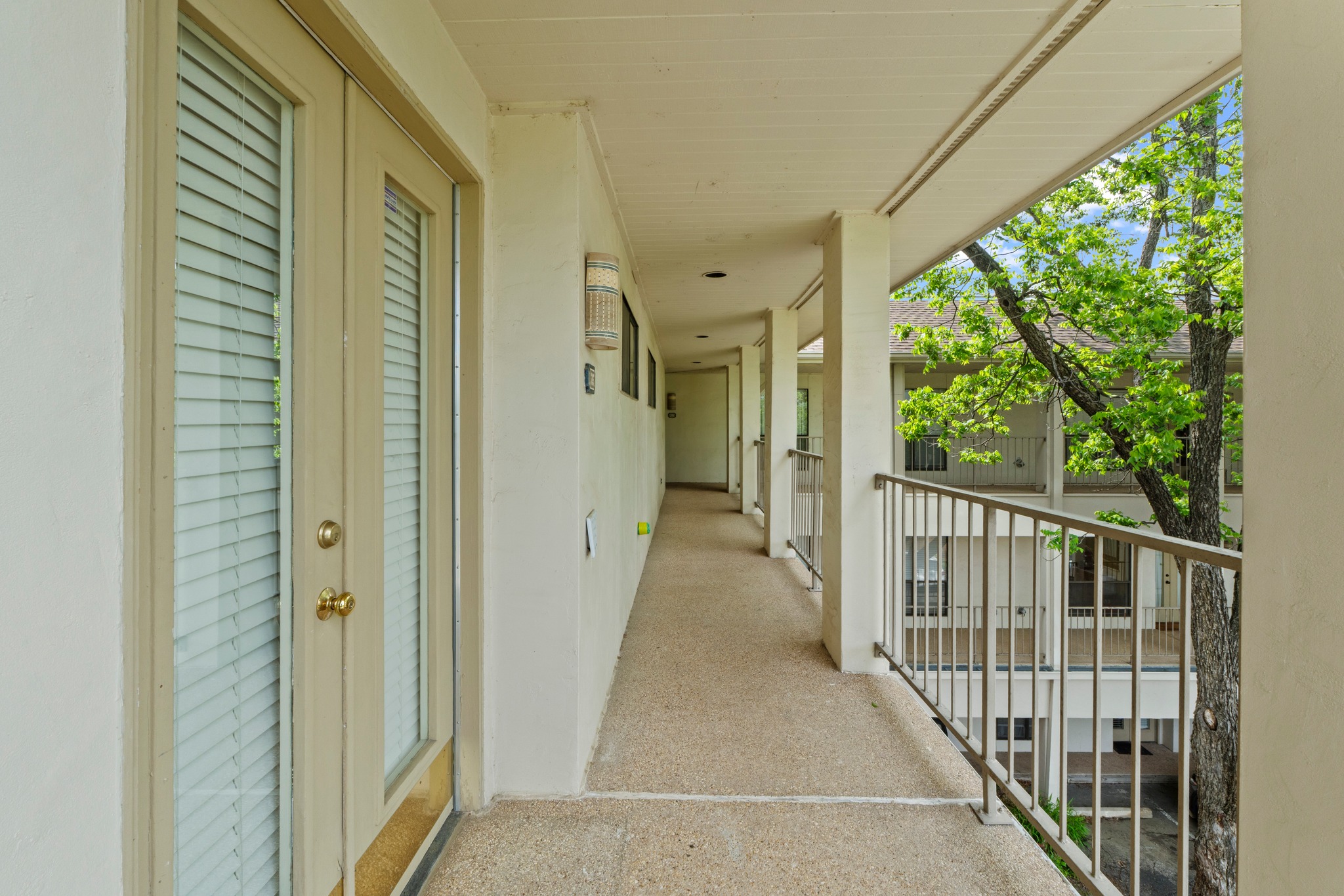 409 East 38th Street, Unit 305 Austin, TX 78705 - Photo 20 of 22 Front door and walkway