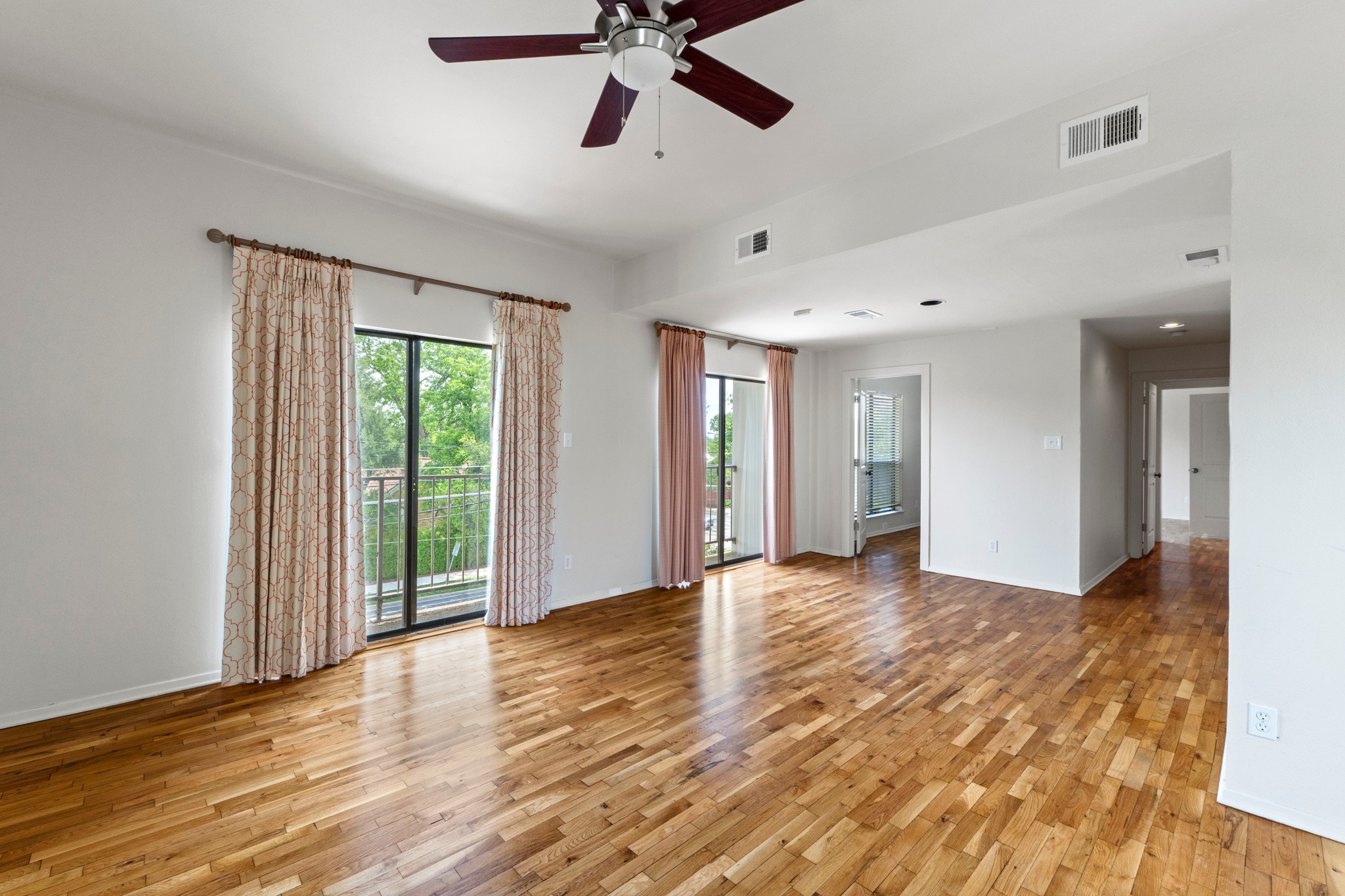 409 East 38th Street, Unit 305 Austin, TX 78705 - Photo 4 of 22 View from the fireplace facing the kitchen/hallway to bedroom