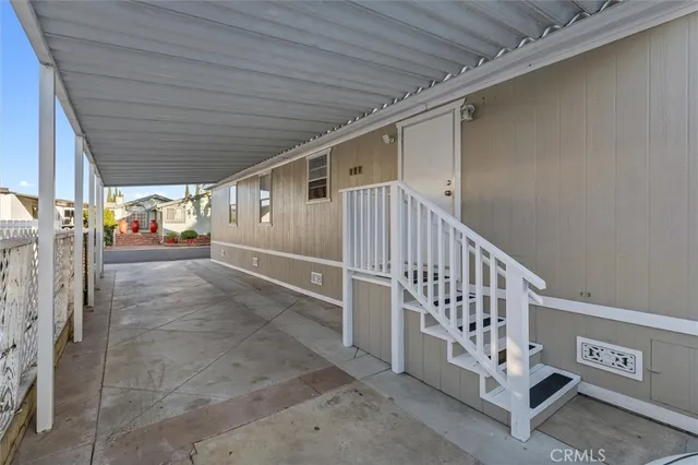 a view of a porch with hardwood