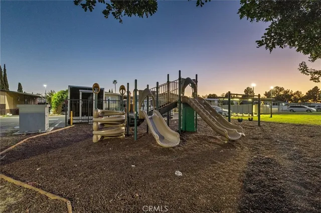 a view of a park with swings