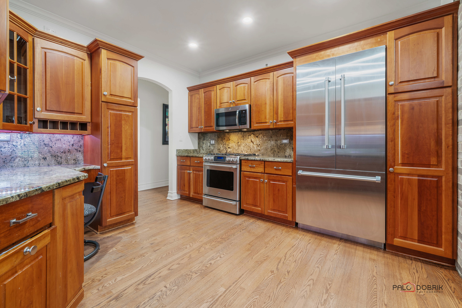 2307 Old Hicks Road Long Grove, IL 60047 - Photo 12 of 59 a kitchen with stainless steel appliances granite countertop a refrigerator a sink and a stove