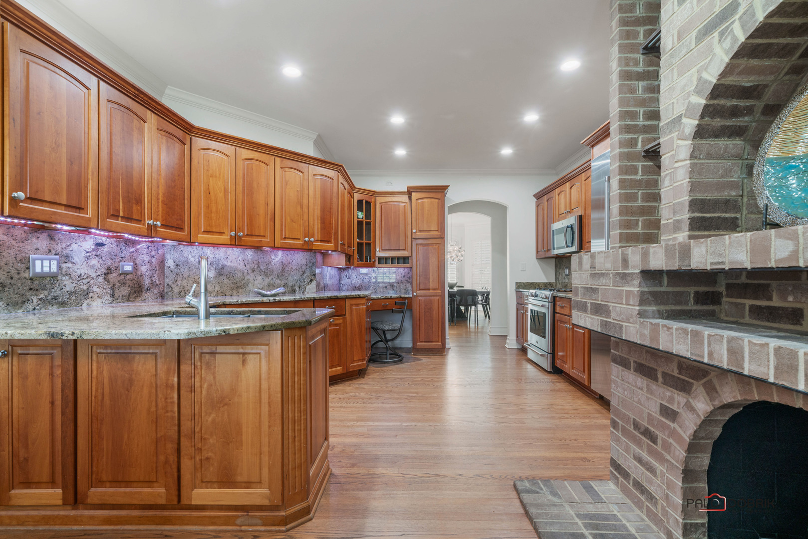2307 Old Hicks Road Long Grove, IL 60047 - Photo 13 of 59 a kitchen with granite countertop lots of counter top space and stainless steel appliances
