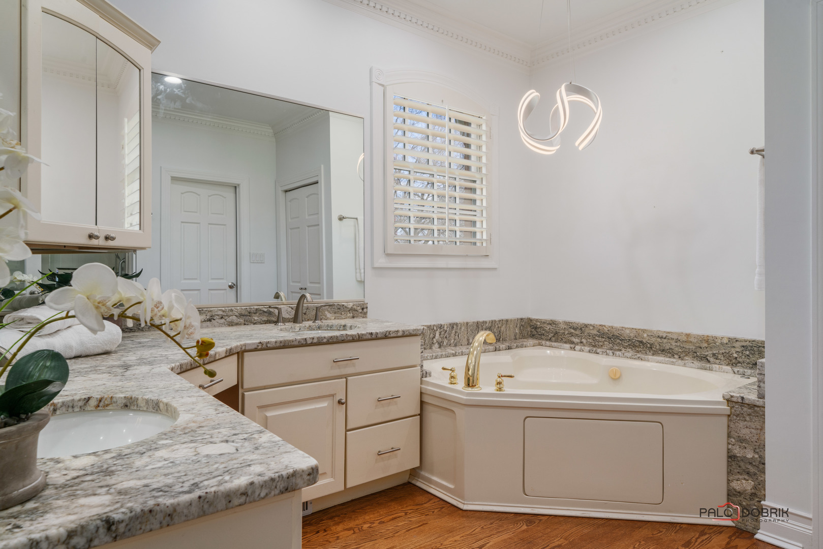2307 Old Hicks Road Long Grove, IL 60047 - Photo 24 of 59 a bathroom with a granite countertop sink and a mirror