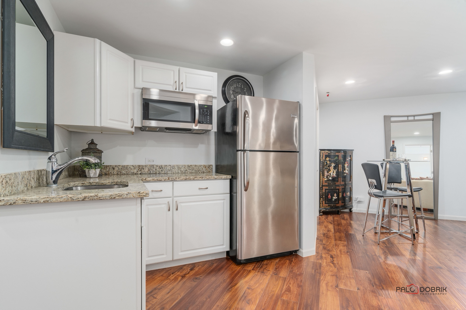2307 Old Hicks Road Long Grove, IL 60047 - Photo 35 of 59 a kitchen with stainless steel appliances granite countertop a refrigerator sink and microwave
