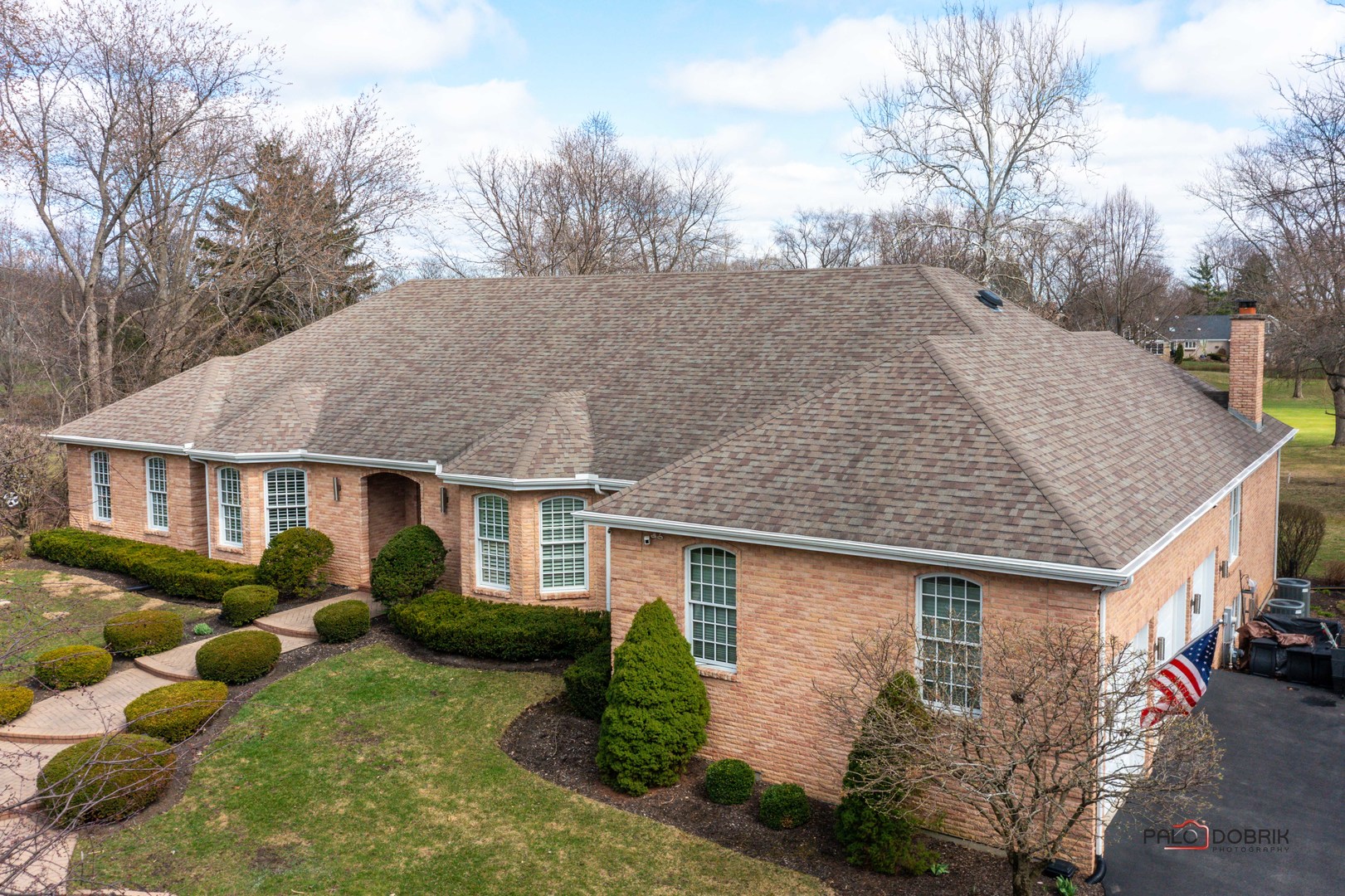 2307 Old Hicks Road Long Grove, IL 60047 - Photo 52 of 59 a front view of house with yard and trees around