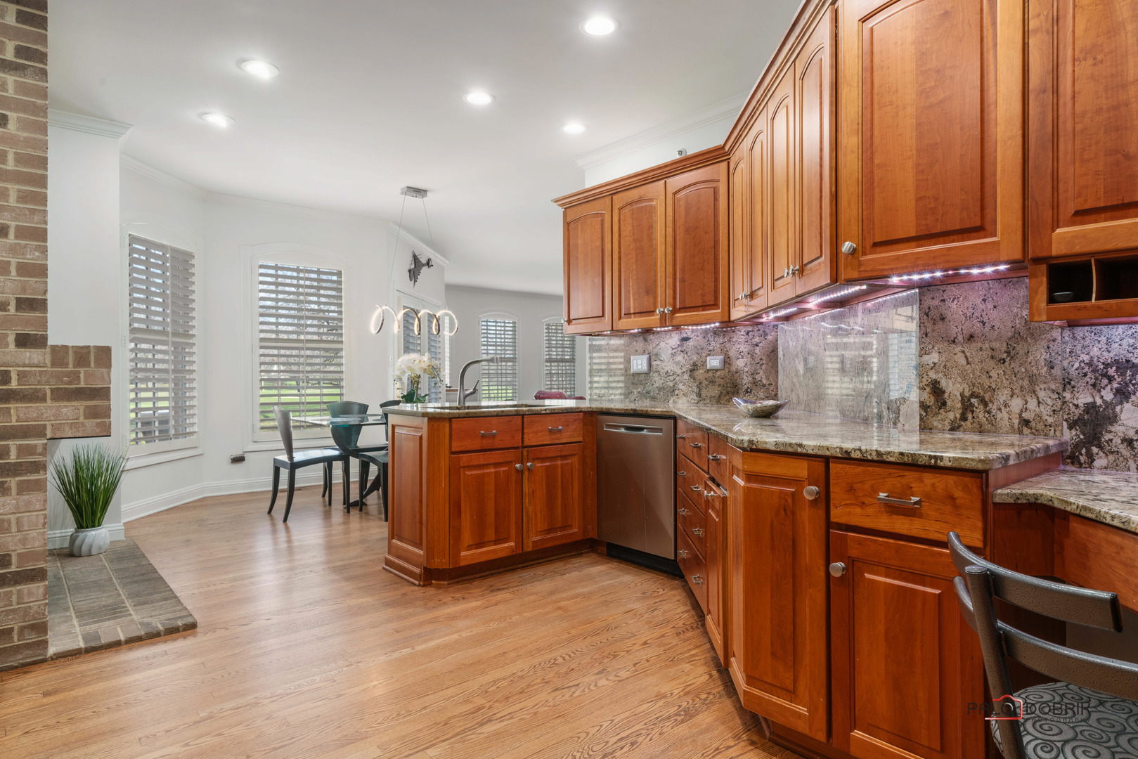 2307 Old Hicks Road Long Grove, IL 60047 - Photo 10 of 59 a kitchen with stainless steel appliances granite countertop wooden cabinets a sink and dishwasher