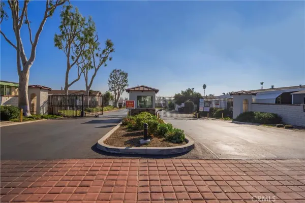 a view of a street with a building in the background