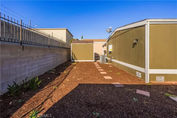 a view of a back yard of the house