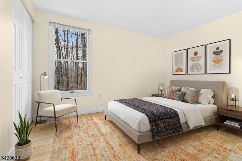 382 Mine Road Asbury, NJ 08802 - Photo 25 of 30 a bedroom with a bed and a couch