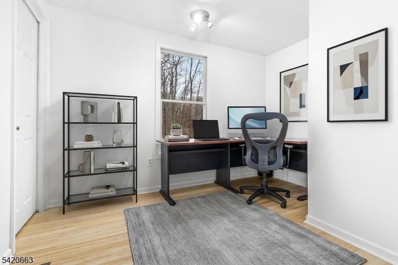 382 Mine Road Asbury, NJ 08802 - Photo 28 of 30 a view of a workspace with furniture and wooden floor