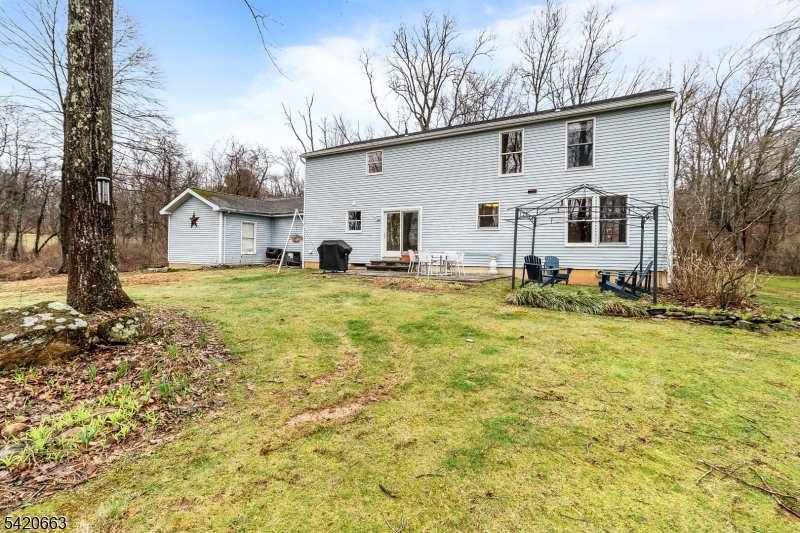 382 Mine Road Asbury, NJ 08802 - Photo 29 of 30 a view of a house with a yard and trees