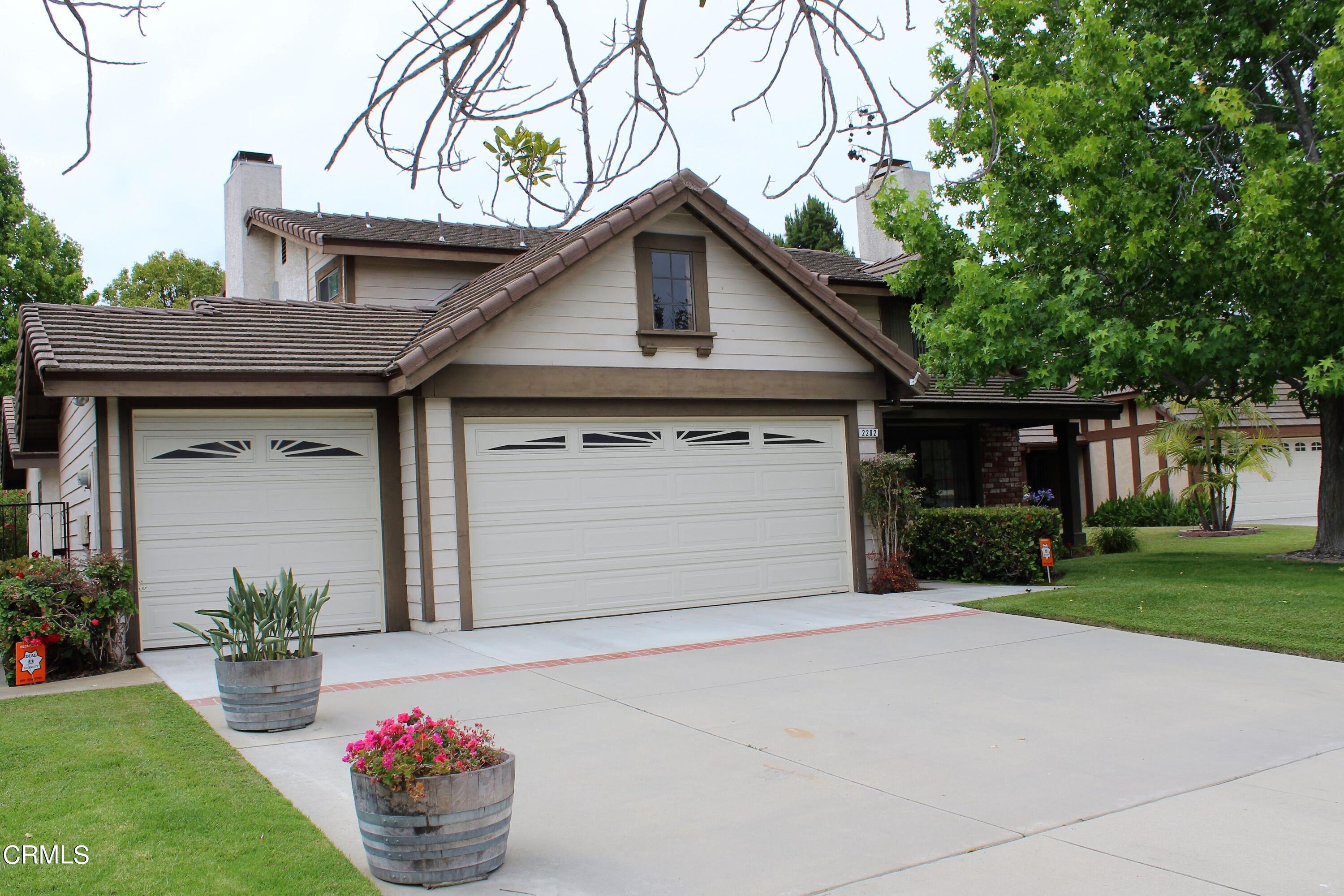 2202 Firestone Court Oxnard, CA 93036 - Photo 2 of 51 a front view of house with yard