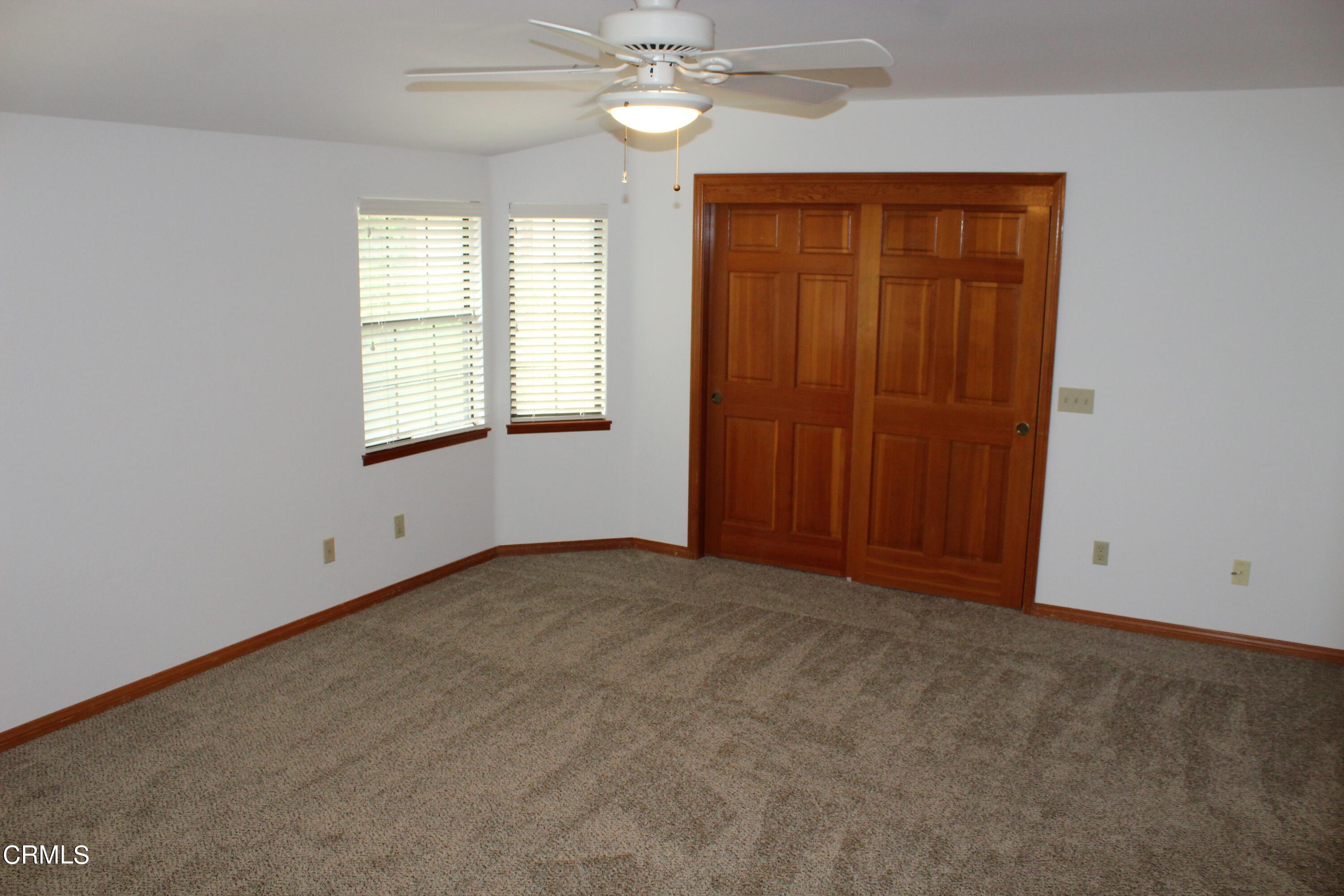 2202 Firestone Court Oxnard, CA 93036 - Photo 37 of 51 an empty room with windows and closet area