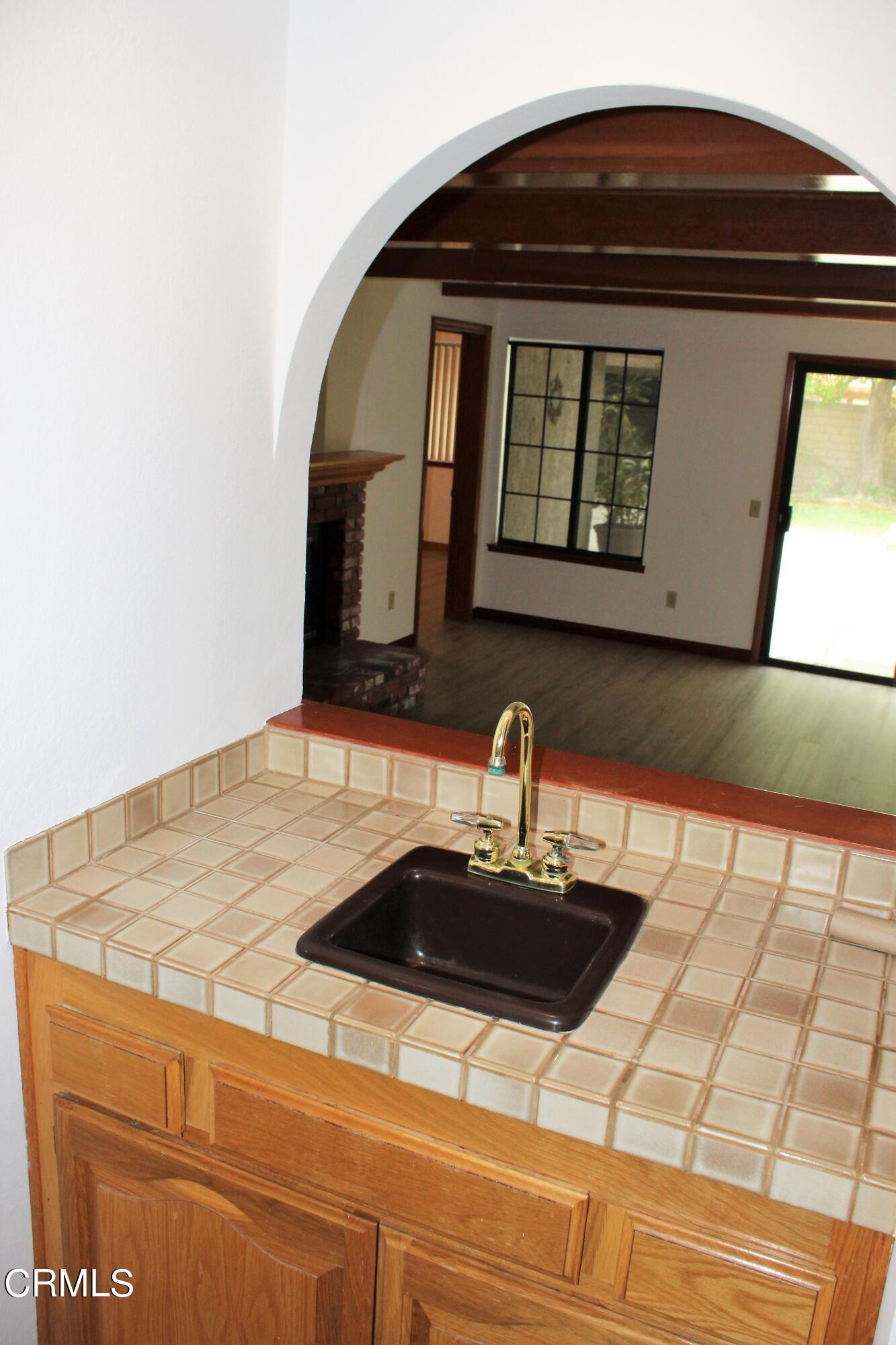 2202 Firestone Court Oxnard, CA 93036 - Photo 39 of 51 a bathroom with a sink and a mirror