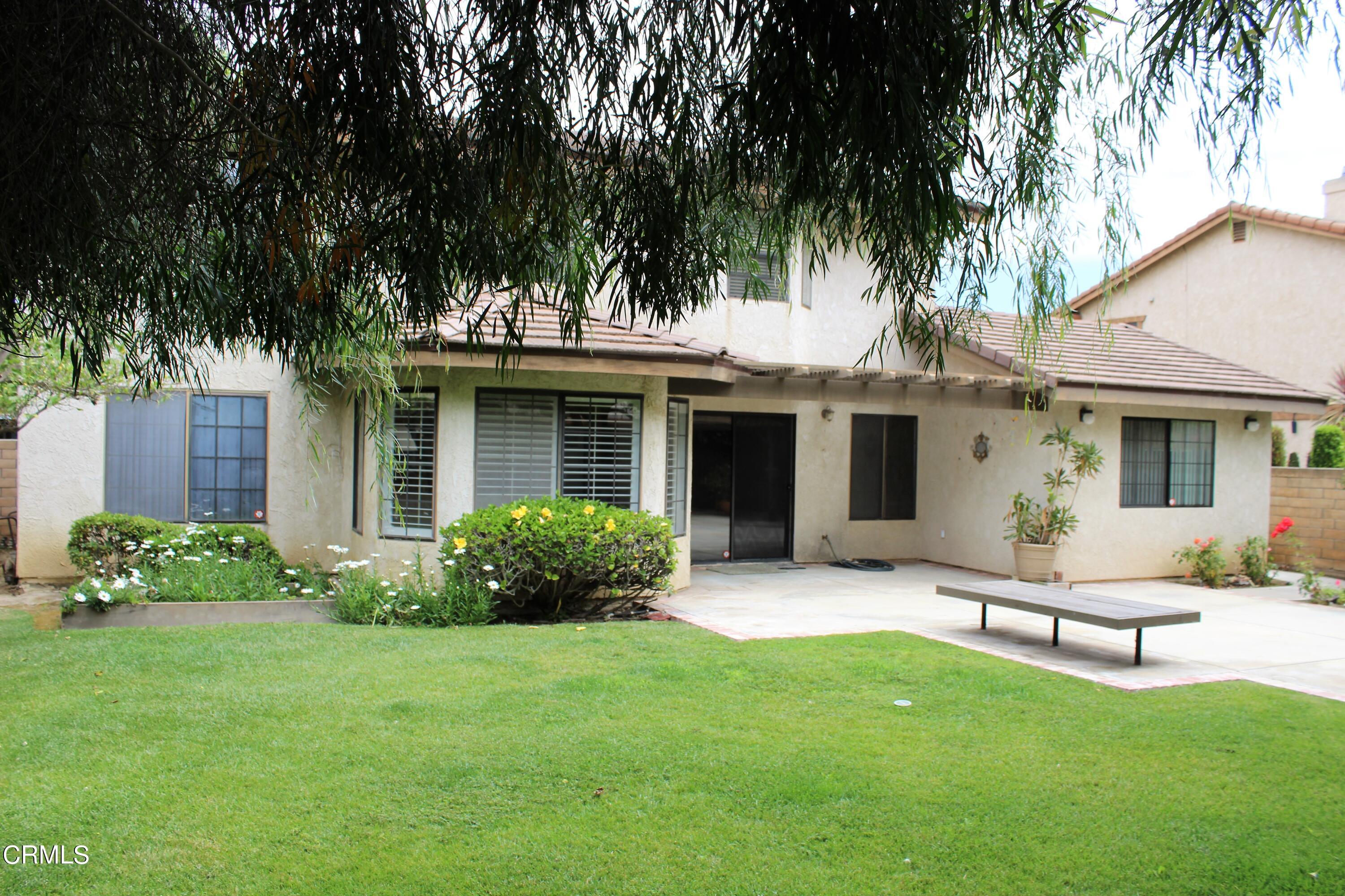 2202 Firestone Court Oxnard, CA 93036 - Photo 4 of 51 front view of a house with a yard