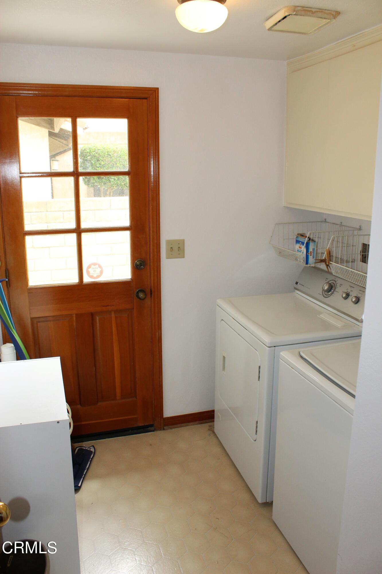 2202 Firestone Court Oxnard, CA 93036 - Photo 42 of 51 a utility room with a sink washer and dryer