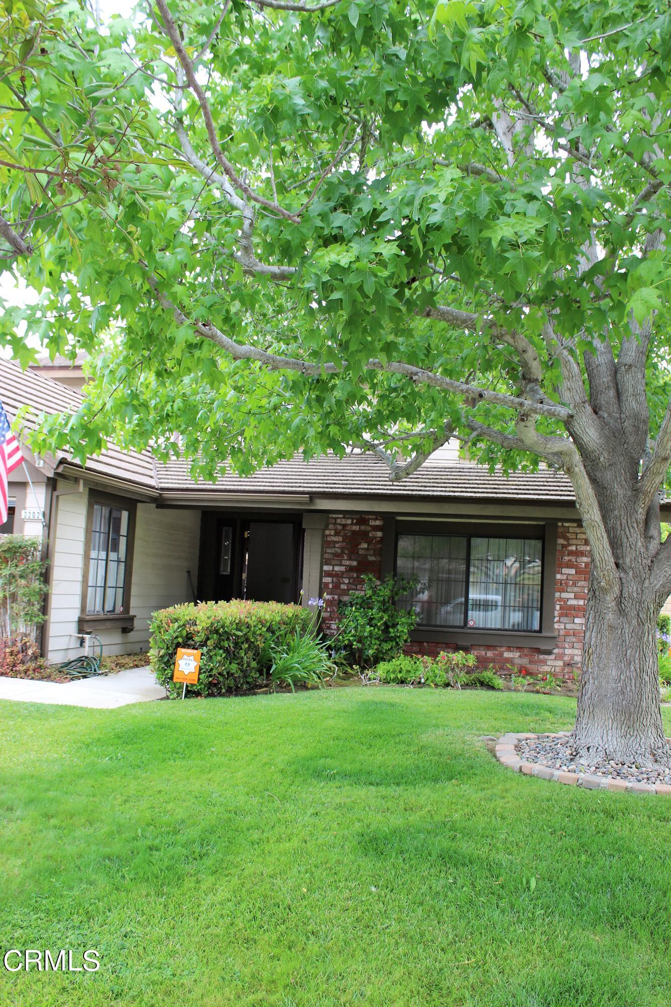 2202 Firestone Court Oxnard, CA 93036 - Photo 50 of 51 a front view of house with yard and green space