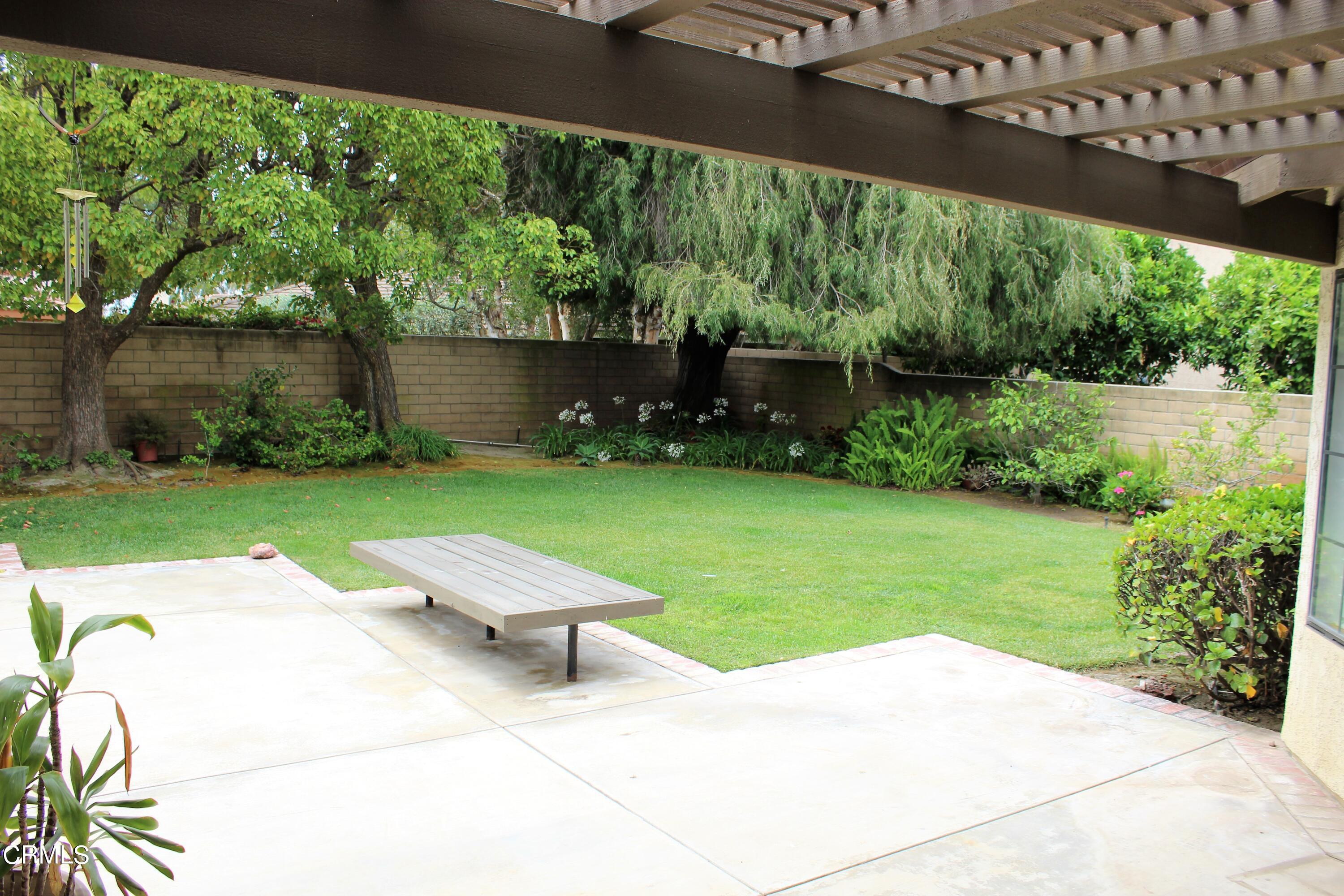 2202 Firestone Court Oxnard, CA 93036 - Photo 5 of 51 a view of a chair and table in the garden