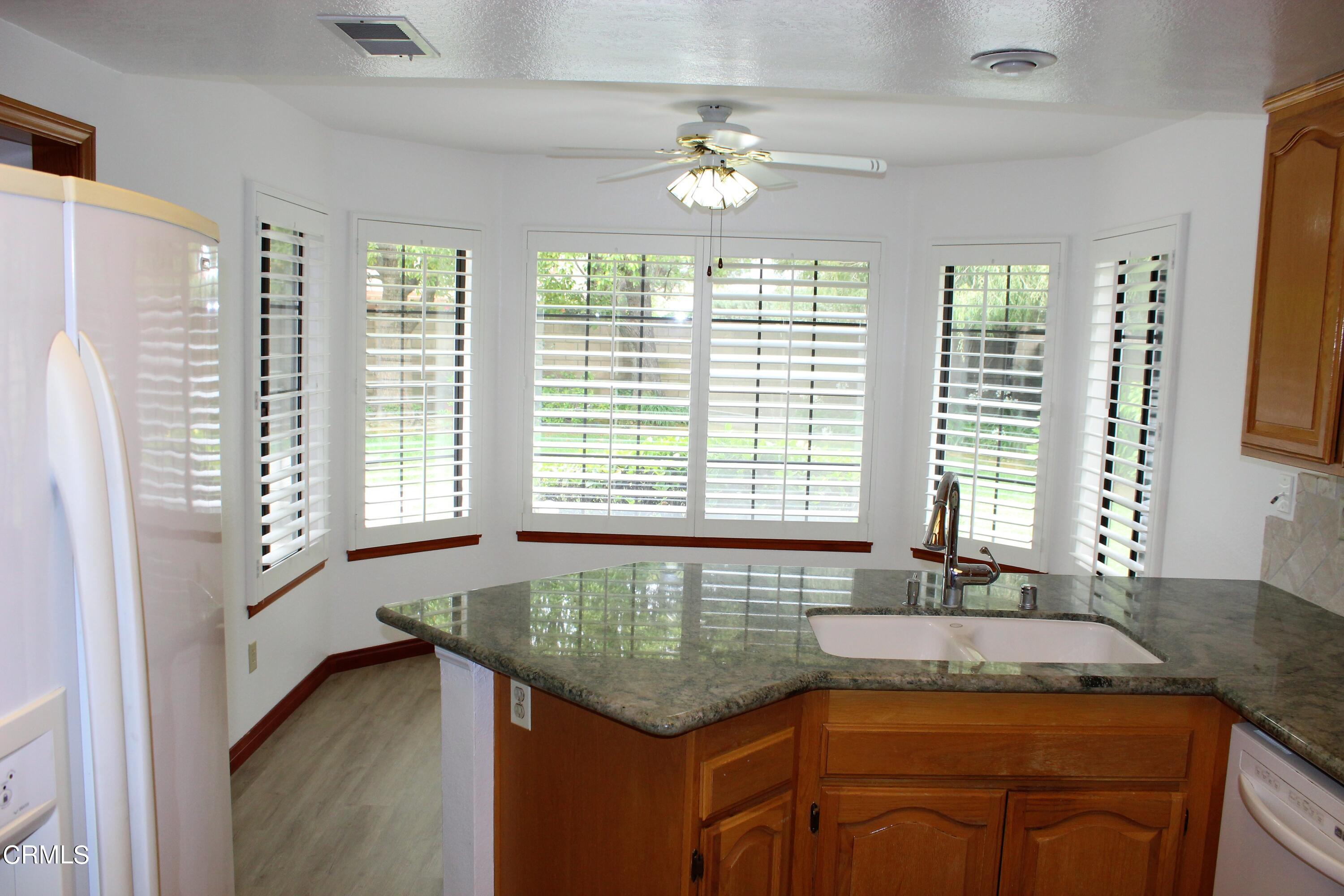 2202 Firestone Court Oxnard, CA 93036 - Photo 8 of 51 a bathroom with a granite countertop sink and a bathtub