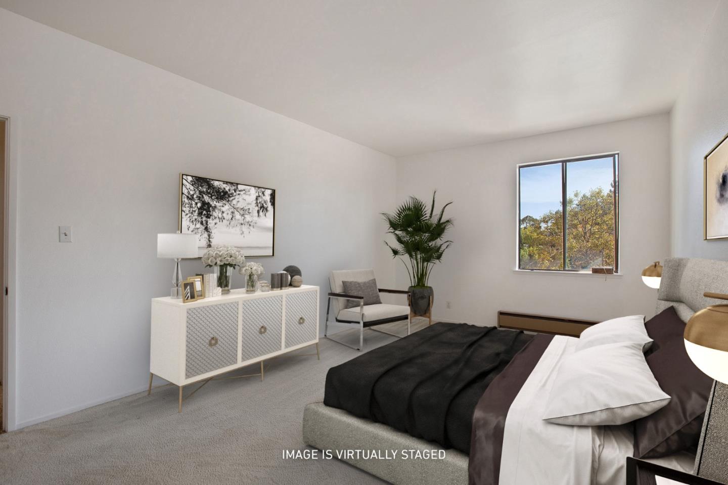 500 Almer Road, Unit 301 Burlingame, CA 94010 - Photo 12 of 24 a bedroom with a bed and a potted plant