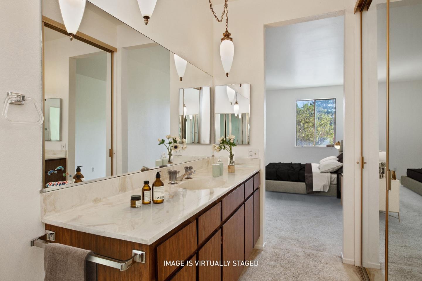 500 Almer Road, Unit 301 Burlingame, CA 94010 - Photo 14 of 24 a en suite bathroom with a sink double vanity and a mirror