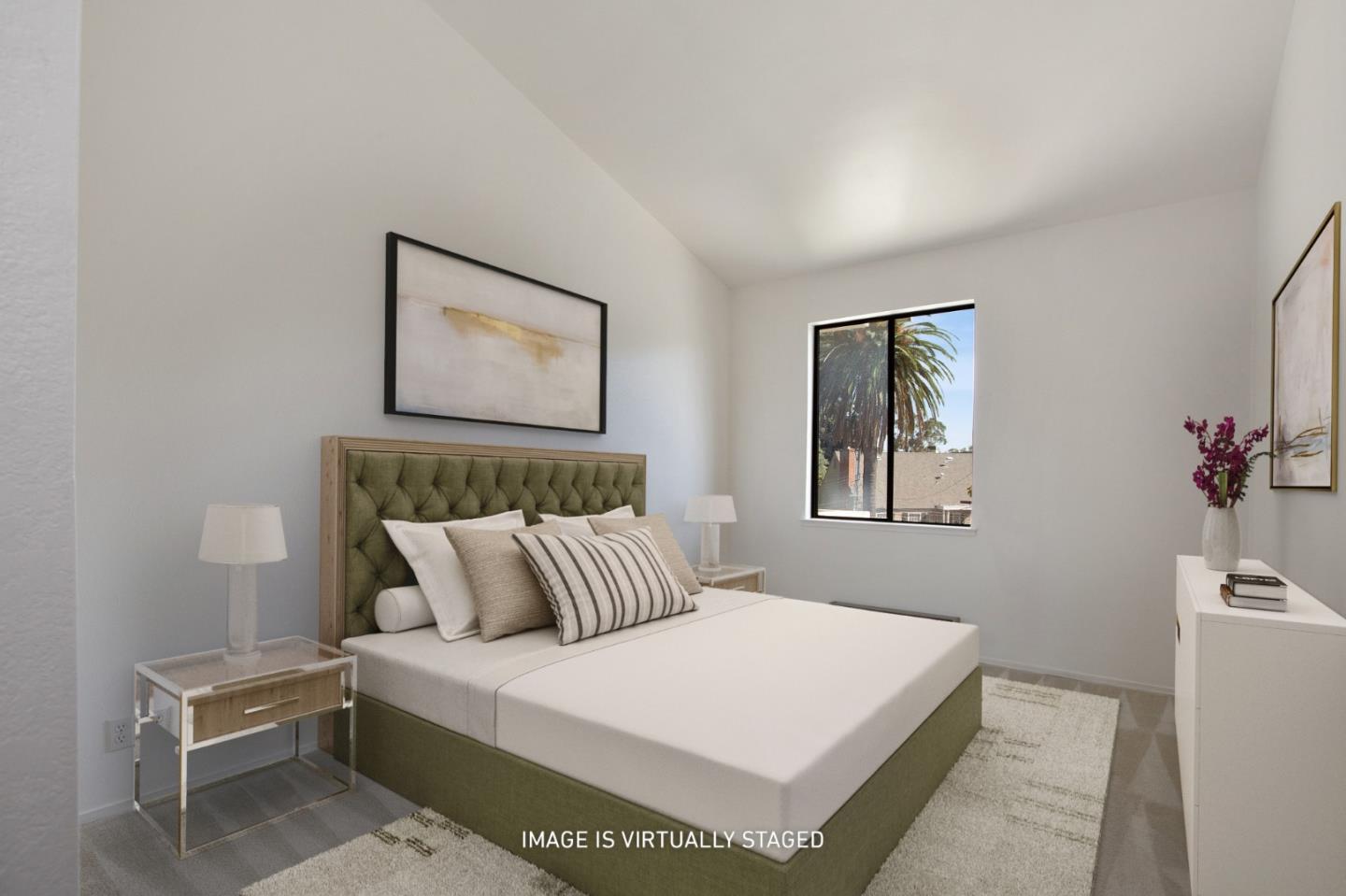 500 Almer Road, Unit 301 Burlingame, CA 94010 - Photo 18 of 24 a bedroom with a bed and a painting on the wall